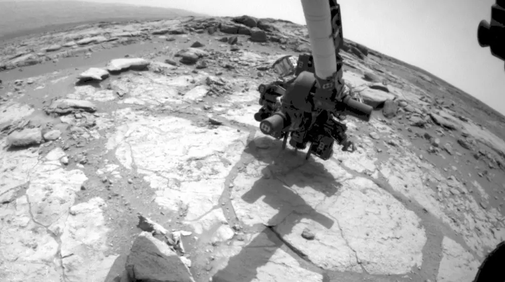 Curiosity rover exploring the Martian landscape.