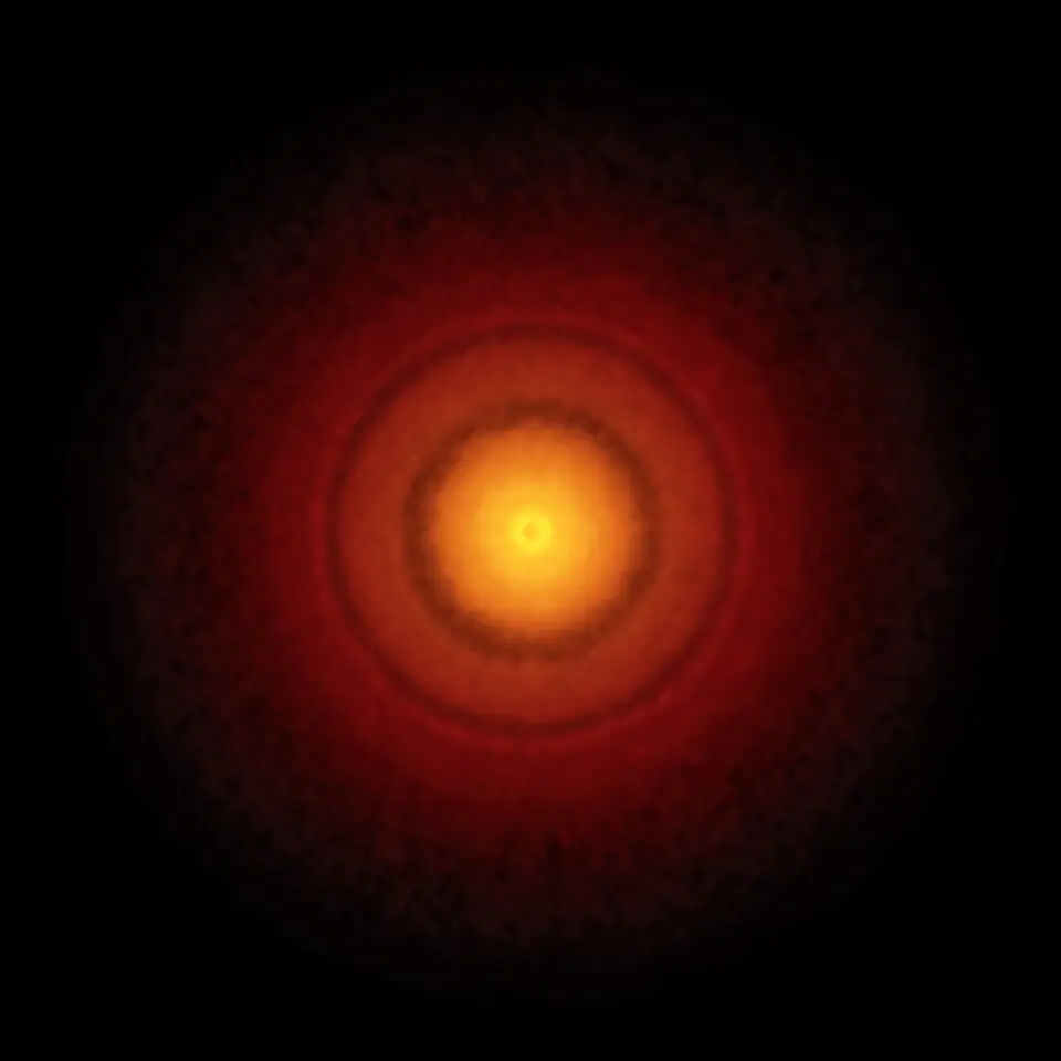 Elias 2-24 b orbits about 55 times farther from its star than Earth is from the Sun.
