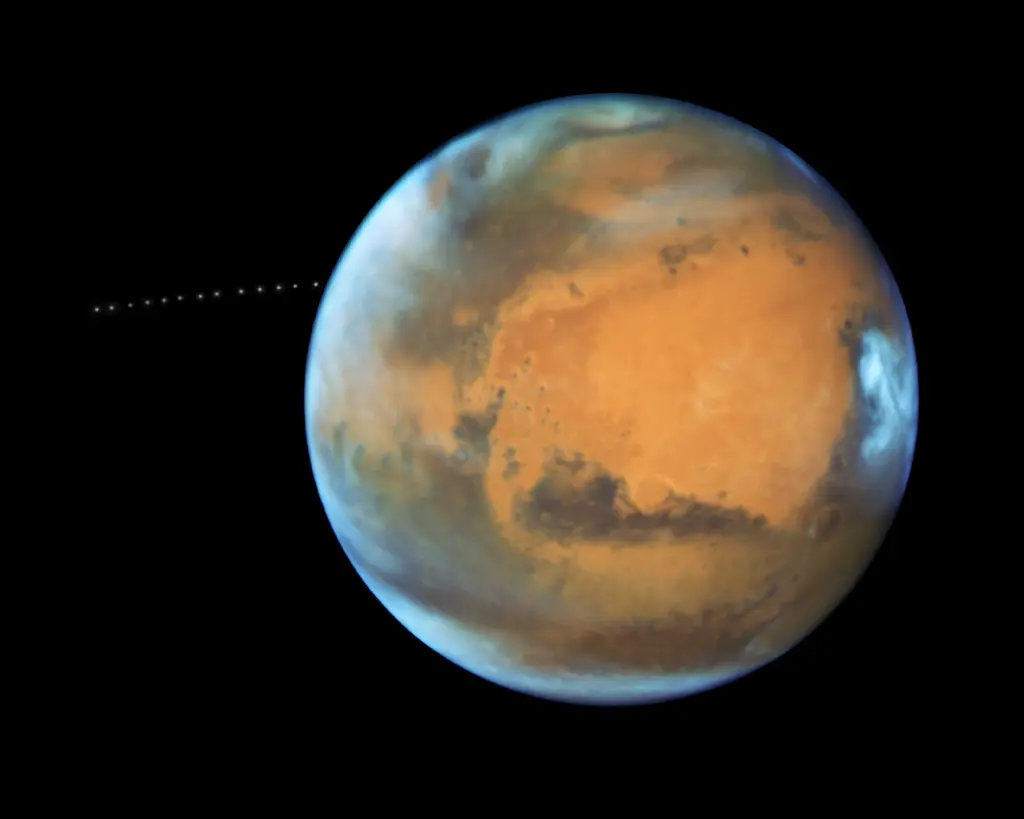 Phobos orbits about 6,000 km above Mars, in an environment where gravity is extremely weak.